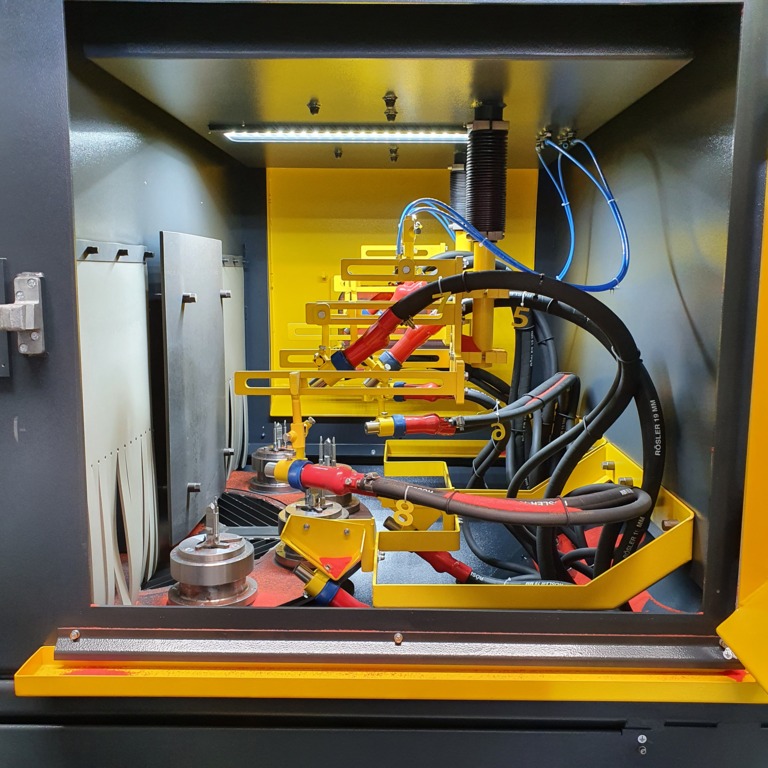 RSA 1500-S10 blast chamber with rotating work piece mounts