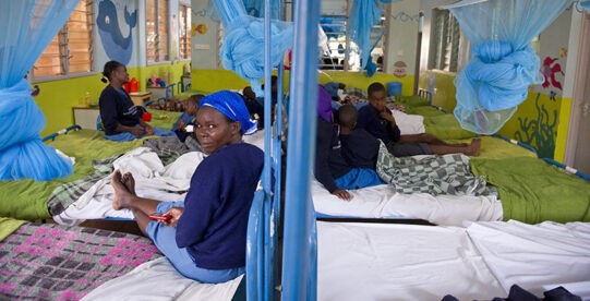 Patients in a makeshift hospital receiving fracture care