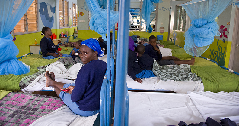 Patients in a makeshift hospital receiving fracture care