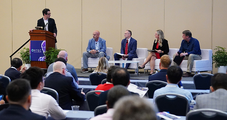 supply chain symposium panel discussion participants at OMTEC