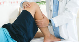Stock are showing a doctor working on the knee of a patient