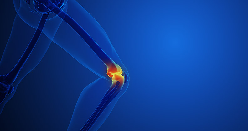 stock image of the knee joint glowing