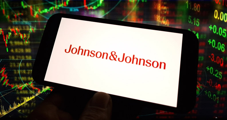 Johnson & Johnson logo on a small white screen surrounded by colorful digital data