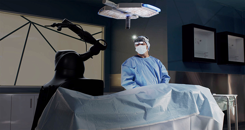 Surgeons operating with Enovis AR technology