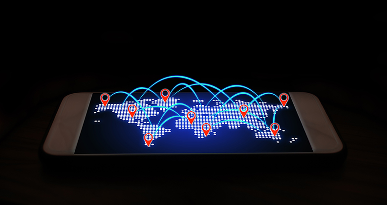Global graphic with interconnected red icons represented global tracking technology