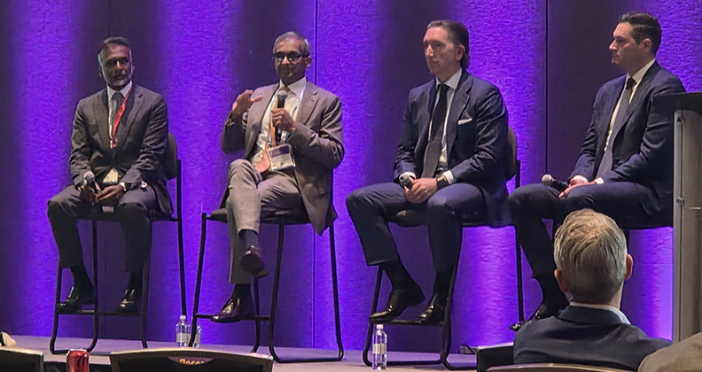 Orthopedic executives on a stage at AAOS