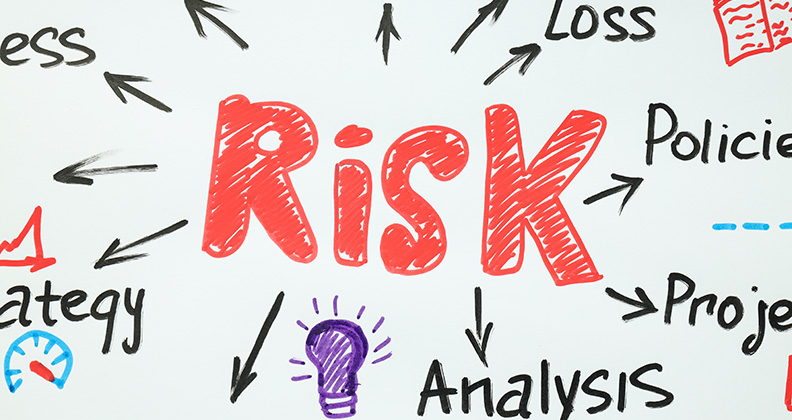 Risk in red lettering on a white background with arrows pointing to project management words in a collage