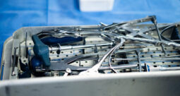 Set of orthopedic implants piled in tray