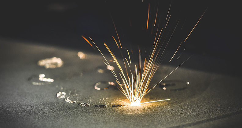 Sparks flying in a laser 3D printing bed