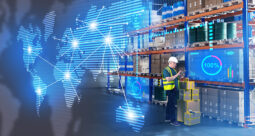 Worker with a hardhat and holding a clipboard in a storage facility